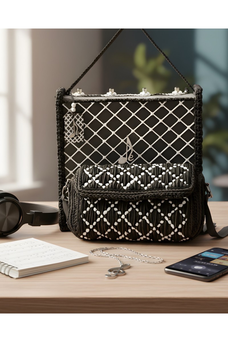 Handcrafted texture of Ava bag showing embroidery and structure