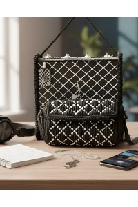 Handcrafted texture of Ava bag showing embroidery and structure