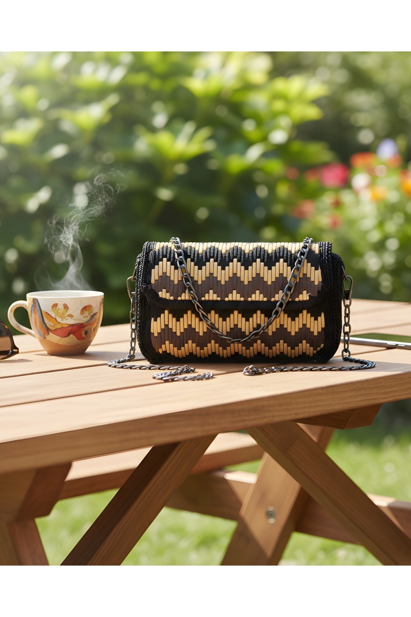 Bidens handmade embroidered bag  outdoors in natural lighting