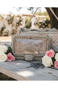 Hand-painted floral artwork on Aganippi Handmade Art Wallet