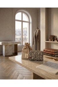 Grace Note Diktamos handmade crochet wallet displayed in an elegant interior