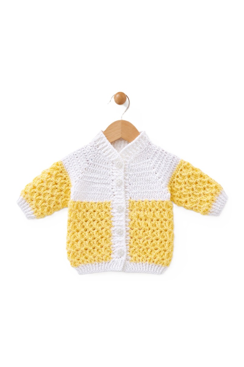 Handmade crocheted baby items set in yellow color