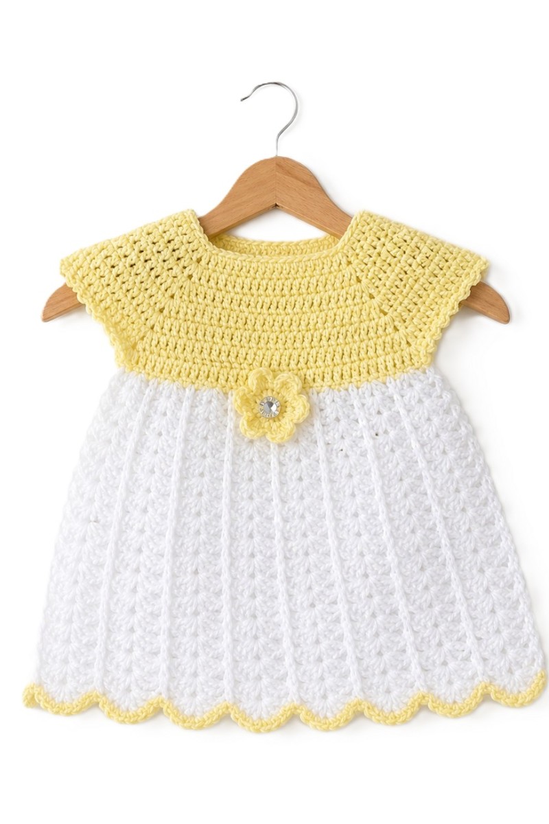 Handmade crocheted baby items set in yellow color