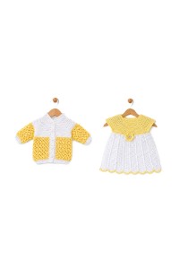 Handmade crocheted baby items set in yellow color