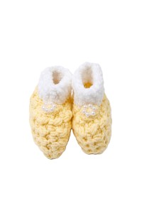 Handmade crocheted baby items set in yellow color