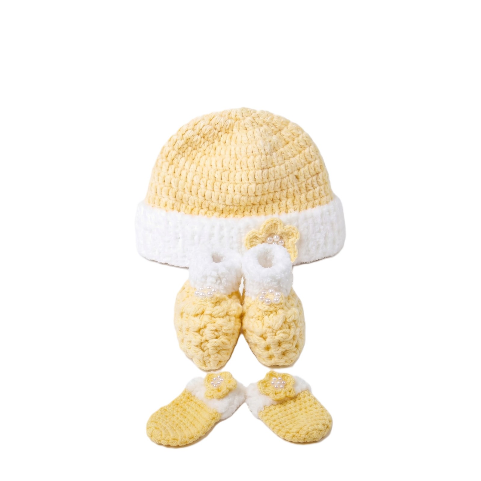 Handmade crocheted baby items in yellow color | Gracenote