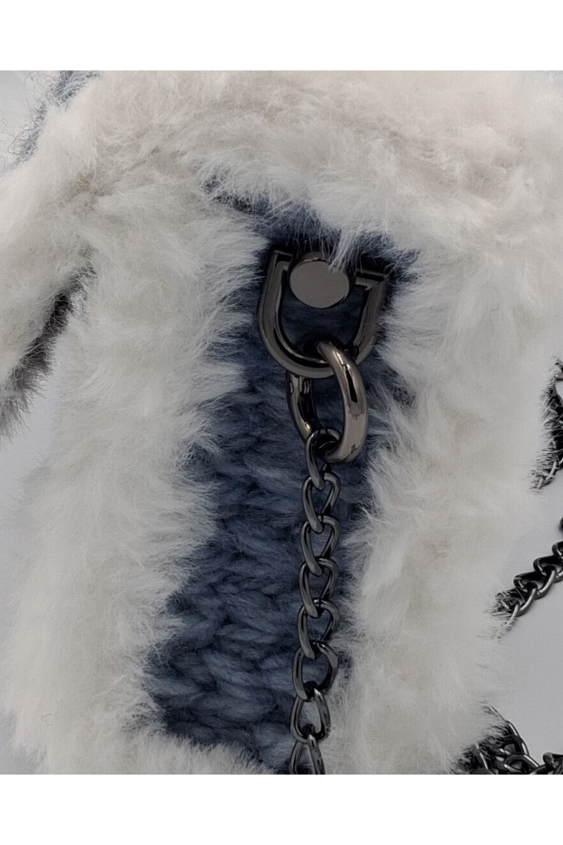 Detail of eco fur accent on Imalia handcrafted embroidered bag