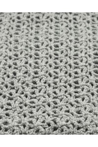 Detail of a handmade crochet scarf in light grey