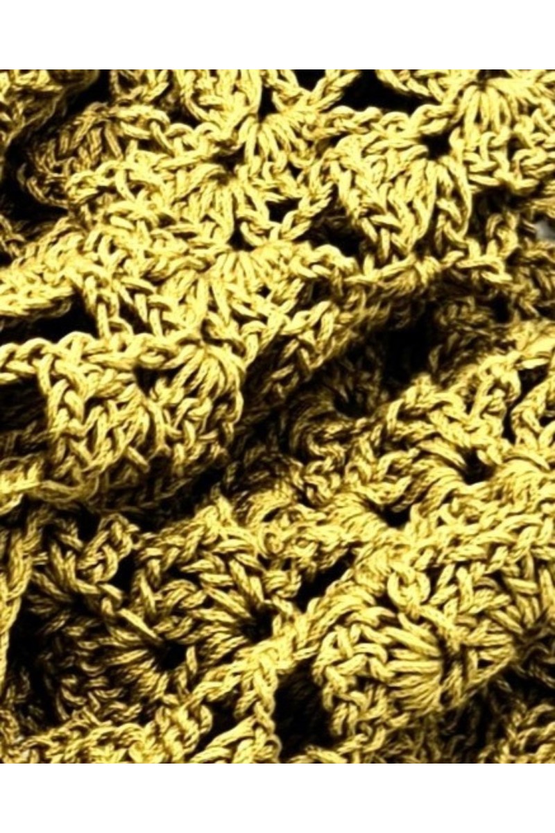Close-up of handmade crochet lace pattern