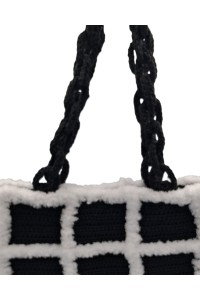 Close-up of the handcrafted crochet handles of the Artemis tote bag by Grace Note.