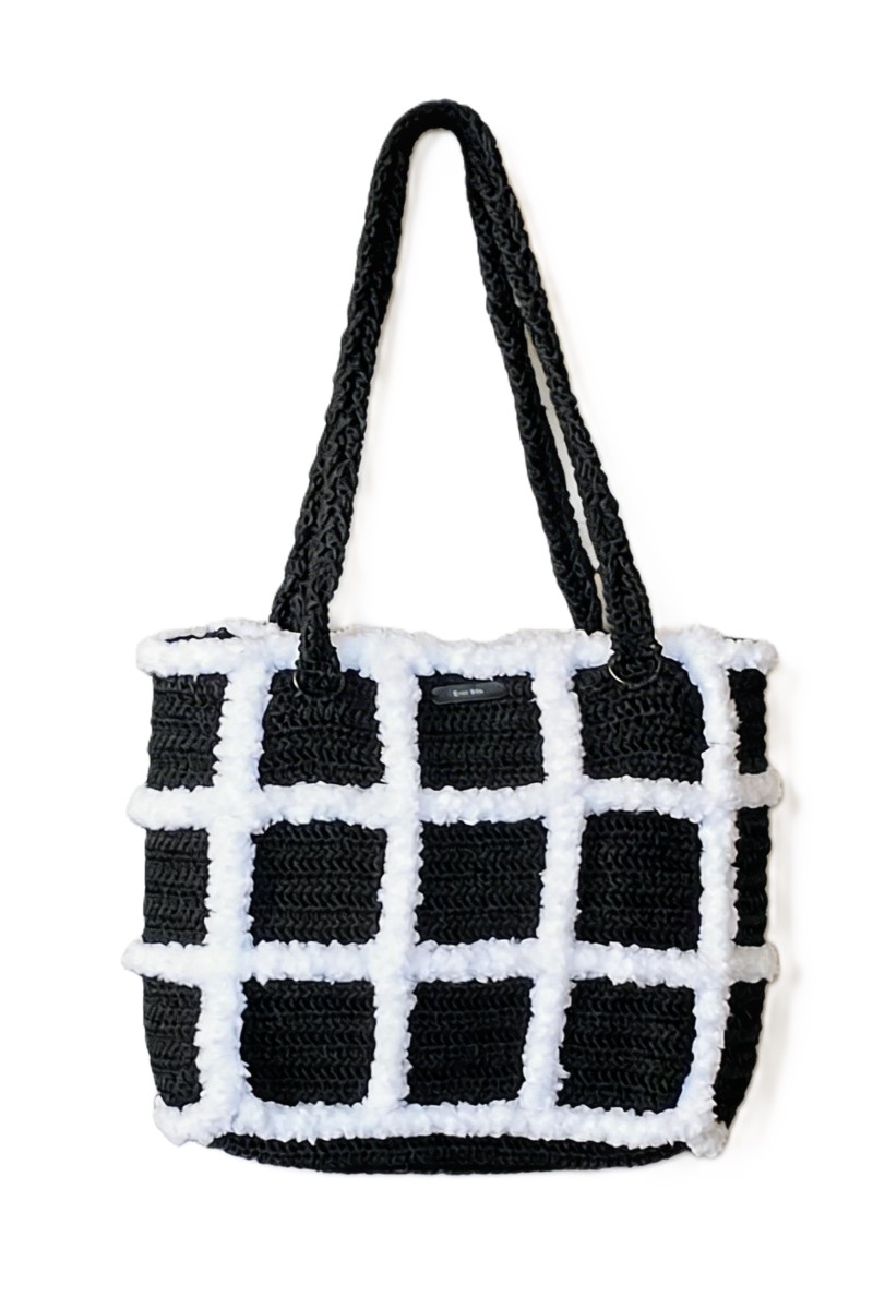 Front view of the Artemis black and white handmade crochet tote bag by Grace Note.