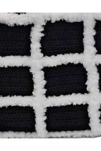 Close-up of the handcrafted crochet texture of the Artemis black and white tote bag by Grace Note.