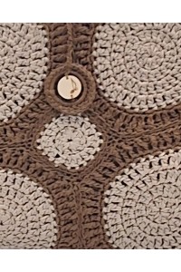 Close-up of the crochet texture and button detail of the Melia tote bag by Grace Note.