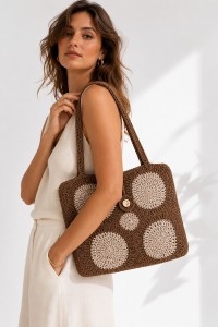 The Melia handmade crochet tote bag by Grace Note styled with an elegant summer outfit in natural tones.