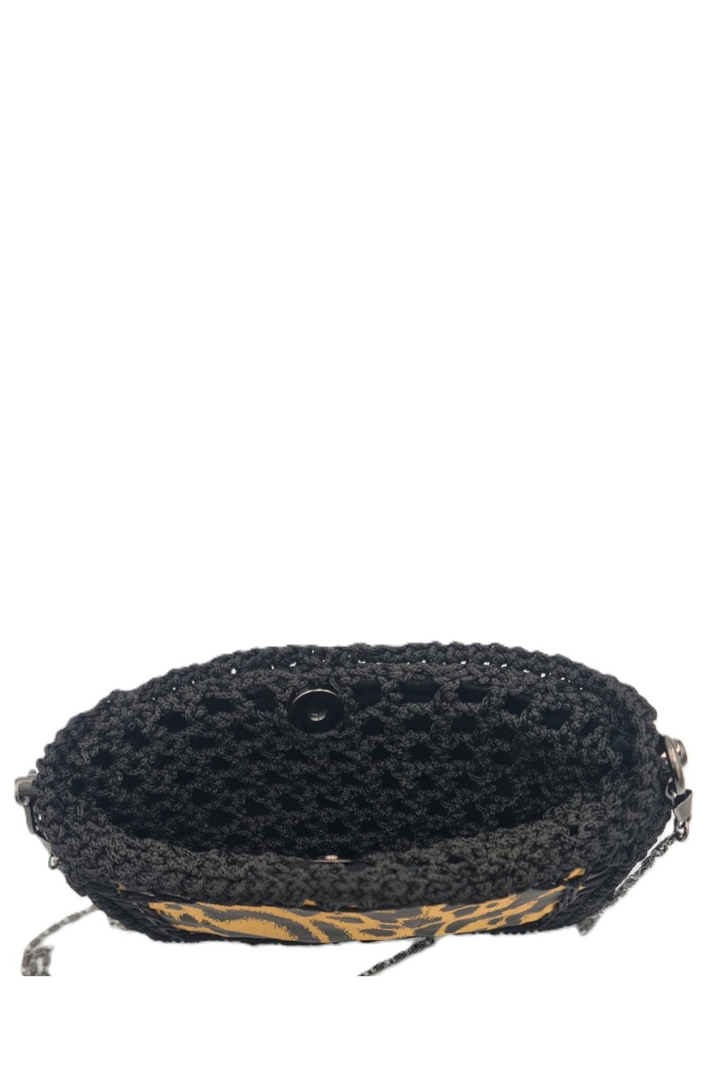 Interior of the Icho Handmade Art Bag with handcrafted crochet lining and magnetic closure