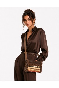 Grace Note Thoosa Handmade Art Bag worn by a model, handcrafted in Greece