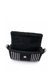 Interior of the Asterodia Handmade Art Bag by Grace Note with fabric lining and magnetic closure.
