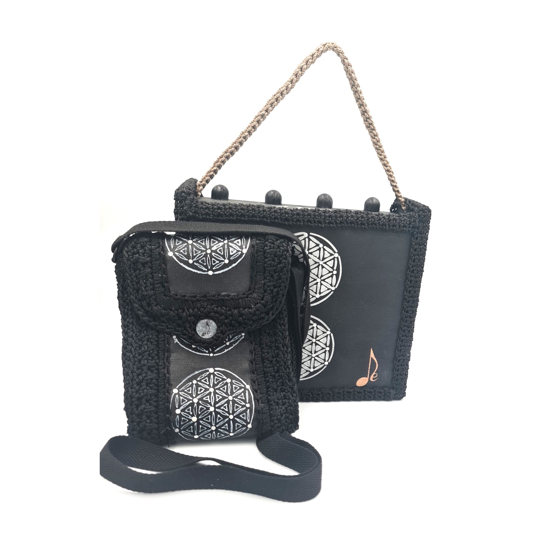 Erytheia hand-painted one of a kind art bag with white circular motifs on dark canvas