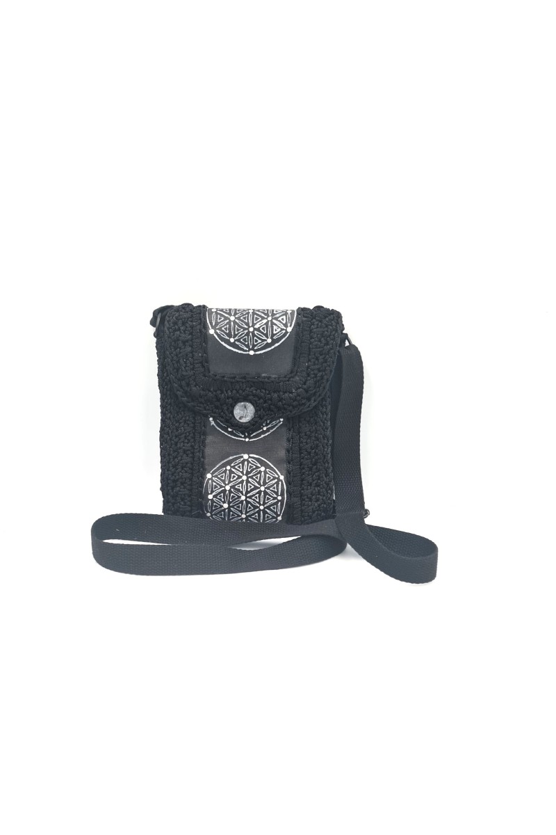 Front view of Erytheia one of a kind hand-painted bag with circular artwork