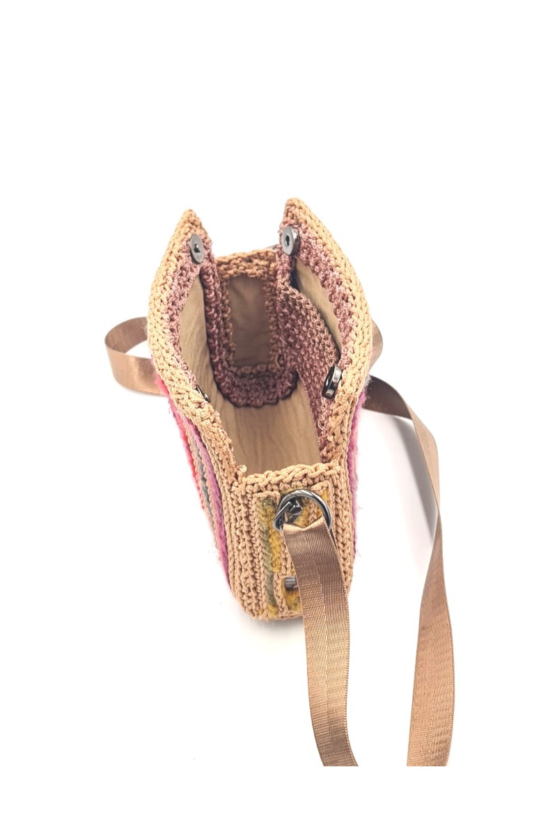 Side view of Endiida handmade  art bag with embroidered details