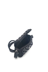 Side view of Ava one of a kind embroidered bag with geometric texture