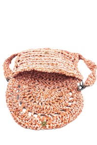 Close-up of handcrafted raffia weaving on a Greek-made bag