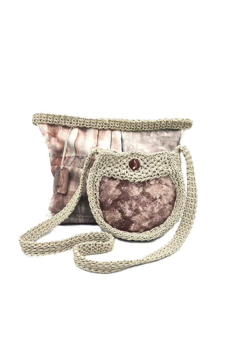 Cistus handmade crochet crossbody bag by Grace Note with its hand-painted storage pouch.