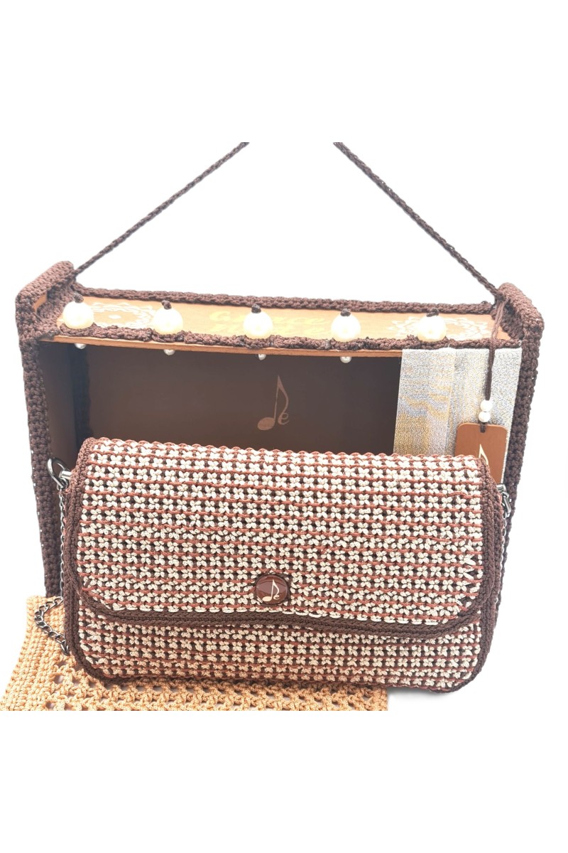 Close-up of fine handmade embroidery details on Volina one of a kind art bag