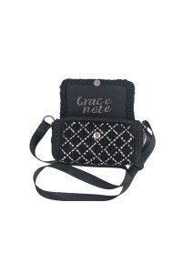 Close up of handmade stitching of Ava embroidered bag