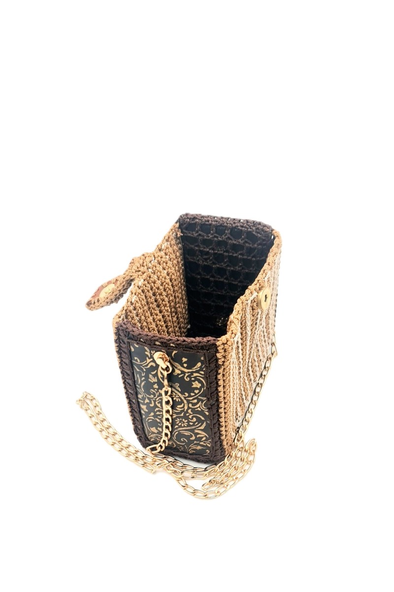 Side view of Agno one of a kind bag with hand-painted golden panels